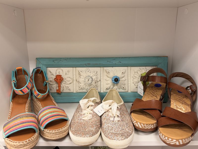 Summer shoes on a Soco Chic shelf with a turquoise filigree backdrop
